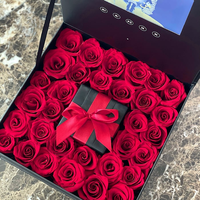 Red Roses in a Video Box with Gift