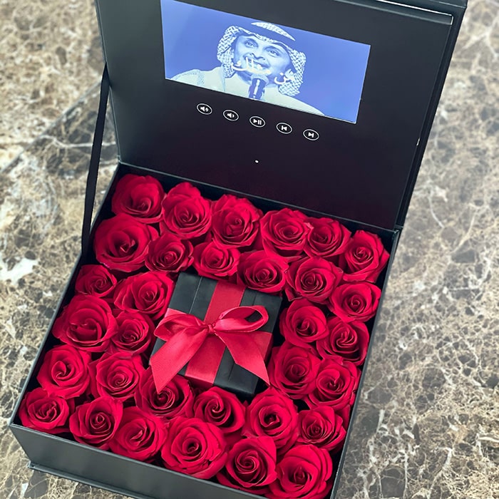 Red Roses in a Video Box with Gift